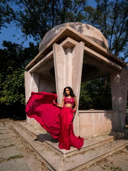 New pieces in now. This red draped Indo-western set with an embroidered top is a fiery and fashionable choice.