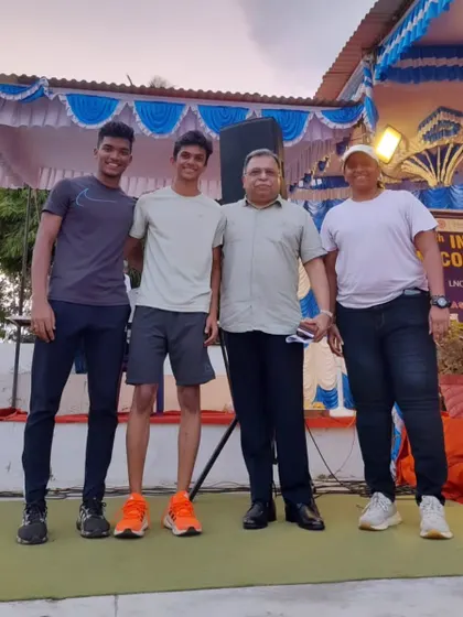 A group photo with an official at the Indian Open 400m Competition. It's always great to see my athletes competing at such well-organized events.