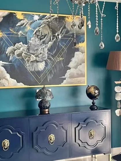 The lion painting viewed from a different angle, showing how it interacts with the room's lighting. The goal was to create a dynamic piece that changes slightly depending on where you stand.