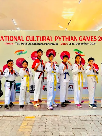 Our champions lined up and ready at the National Pythian Games. Their strong stances show they are prepared to give their best performance.
