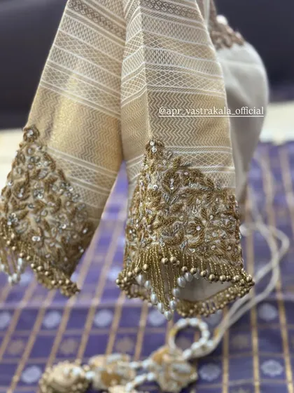 Another view of the gold embroidered sleeves.