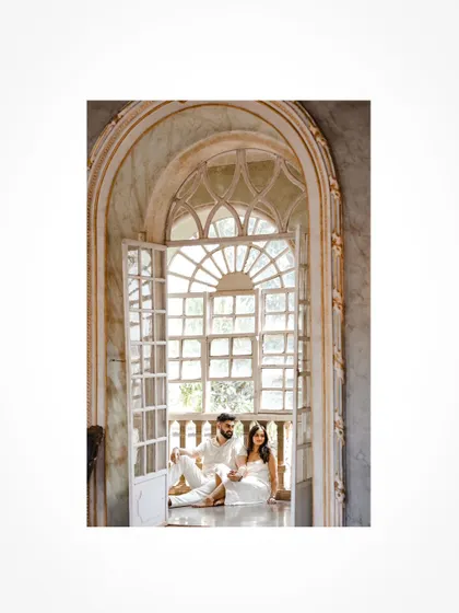 A beautifully framed shot using a large window in a Goan heritage house.