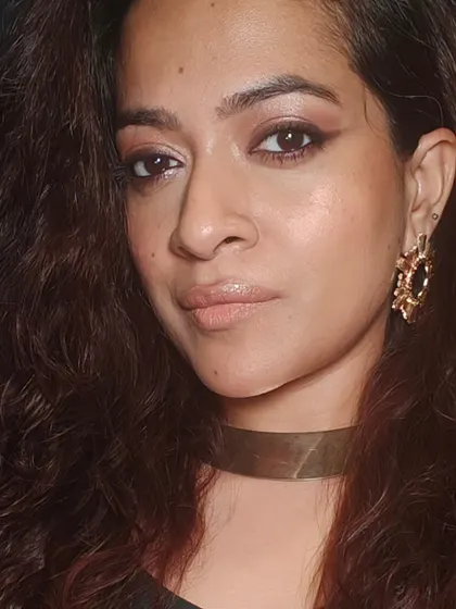 This angle shows the beautiful gold shimmer on the eyelids. It's a simple way to make your eyes sparkle for a special occasion.
