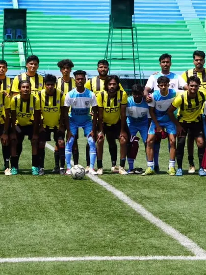 Our senior team lines up alongside Chitradurga FC before a competitive match at Bangalore Football Stadium.