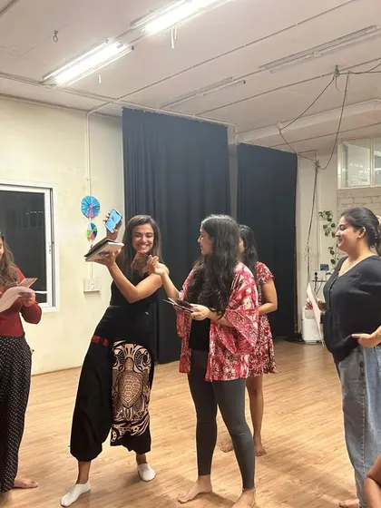 A playful moment during our women's circle. We use rituals and creative expression to connect with our feminine energy.