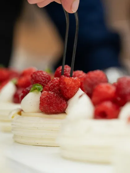 The final touch. Chef Antonio Bachour carefully places fresh raspberries on a delicate pavlova during his masterclass at our new Delhi school.