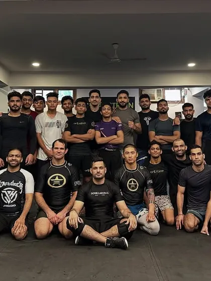 Another shot of our warriors after a game-changing seminar on cage wrestling. The knowledge gained in these sessions translates directly to dominance in the cage.