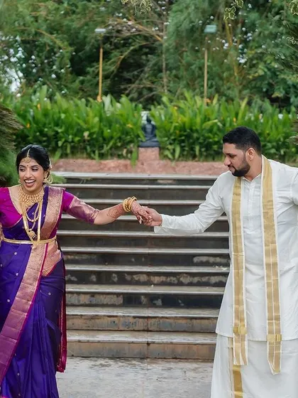 A playful moment between the couple. Our goal is to create a relaxed environment where you can have fun, resulting in genuine and joyful wedding photos.