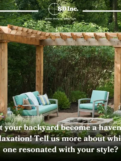 A simple wooden pergola defines this backyard seating area, providing partial shade and a sense of structure. It's an effective way to create a comfortable outdoor room within a garden setting.