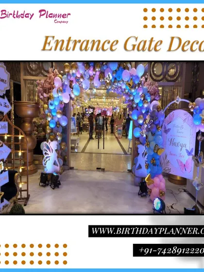 A truly grand entrance gate for a butterfly-themed party. The elaborate balloon arch is complemented by fairy light props, butterfly cutouts, and a custom welcome sign with directional pointers.