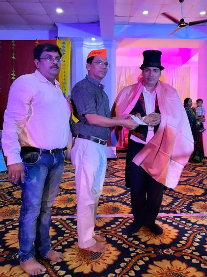 Being felicitated on stage during a Ganesh Utsav celebration. It is always an honor to be recognized by the communities I perform for.