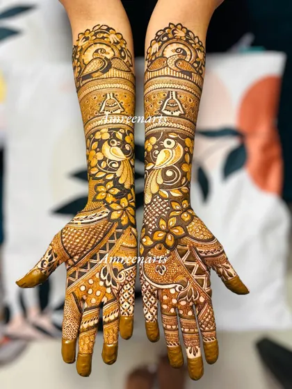 An intricate and beautiful design perfect for Karva Chauth. The pattern is full of detail, featuring peacocks and flowers, symbolizing love and celebration.