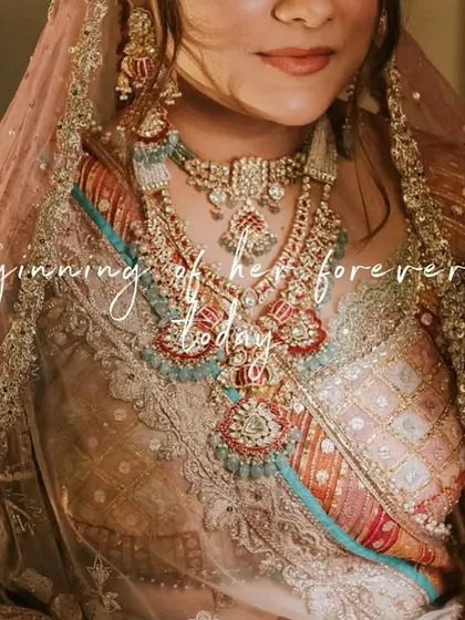 "The beginning of her forever starts today." A close-up on the intricate details of the bride's jewelry and outfit, a testament to the beauty of her special day.