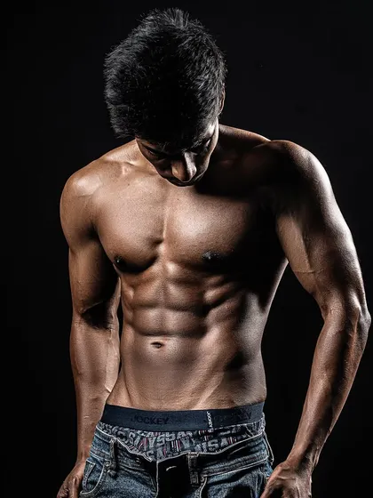 Another powerful shot from a client's photoshoot after his 100-day transformation. This is the reward for all the hard work.