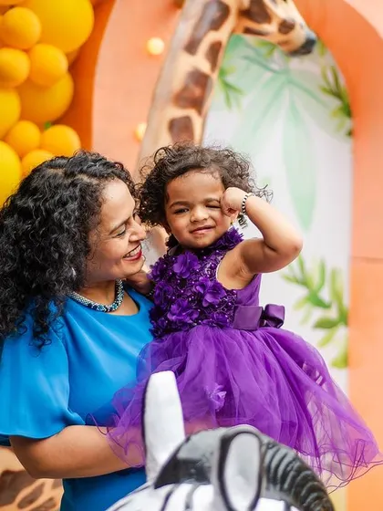 A joyful, candid moment between the birthday girl and her mom. These are the unscripted, happy memories that a great party is all about.