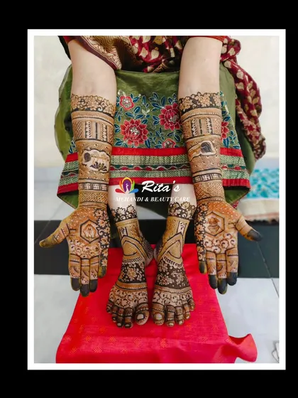 The full mehendi for both the mother and daughter, featuring coordinated designs that symbolize their shared spiritual journey.