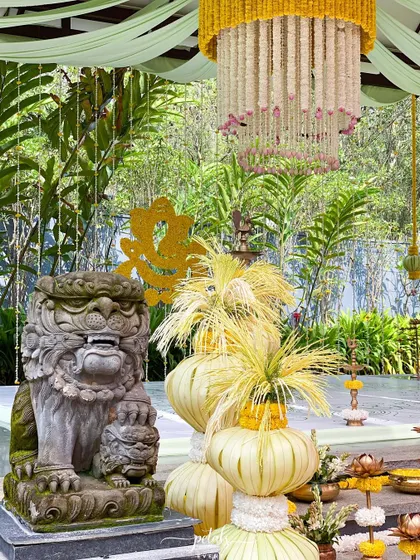 A close-up of a stone lion statue, part of the grand and traditional decor.