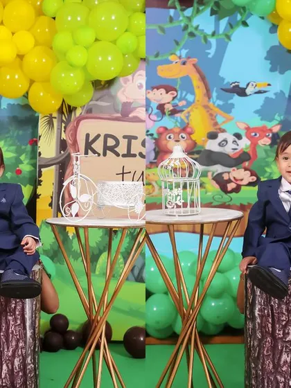 A vibrant 'Circus' themed birthday party, with red and white stripes, clown props, and colorful balloons, bringing the excitement of the big top to your event.