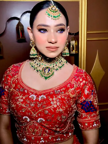 A close-up of the electric blue eyeliner, paired with a peachy nude base and dewy skin. This is how we redefine bridal glam for 2025.
