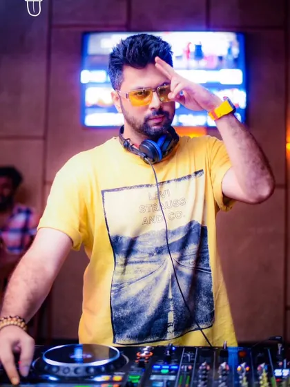 A candid from a Thursday night at The Fixx. The yellow shirt matches the bright mood, ready to make new memories.