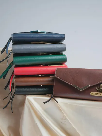 My Women's Nexa Clutch is a stylish and functional accessory. It's available in 7 different colors and can be personalized with a nameplate and a charm.