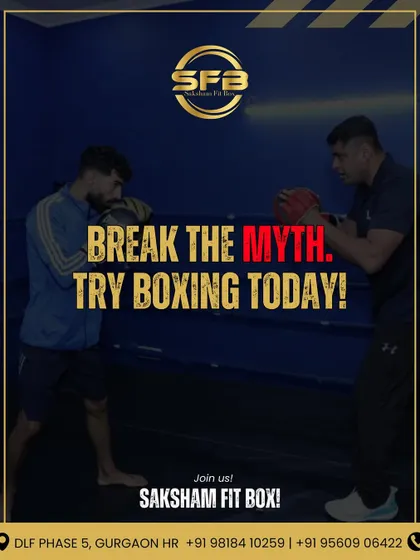 Break the myth and try boxing today. This image of a coach and member in the ring encourages you to experience the real benefits of boxing, which go far beyond common misconceptions.