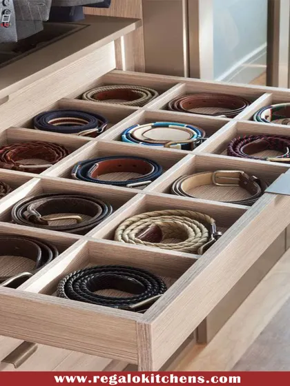 A simple yet effective solution for belt storage. This compartmentalized drawer keeps belts coiled and easy to find, preventing tangles and damage.