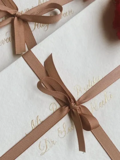 There's something so timeless about hand-addressed envelopes. I love working with different color palettes and textures, from classic gold on handmade white paper to crisp white on rich brown envelopes.