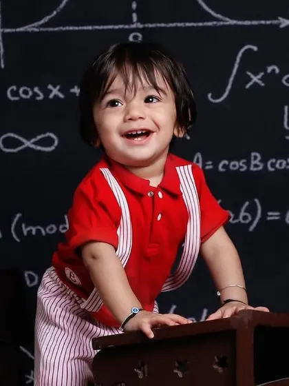 The happiest student in the class. Our 'back to school' theme is full of smiles and adorable props.