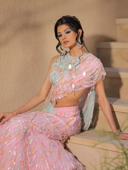 The complete look is a work of art. The colourful makeup and unique outfit create a truly memorable image.