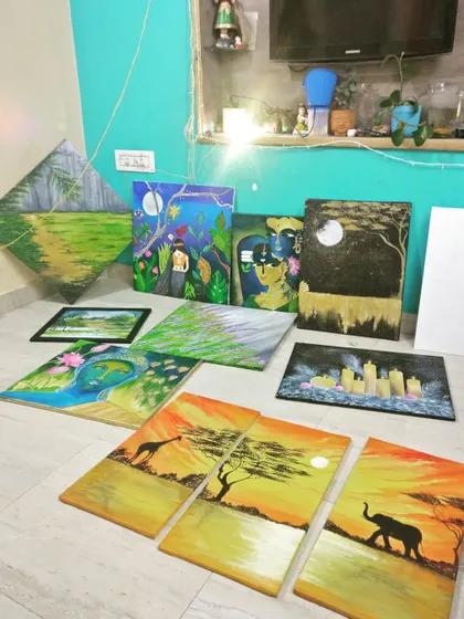 A collection of my various acrylic paintings displayed in my home studio.