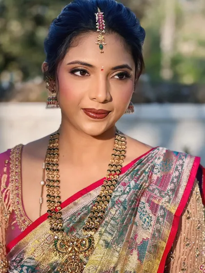 Sneha's complete look, radiating elegance and grace for her special housewarming ceremony.