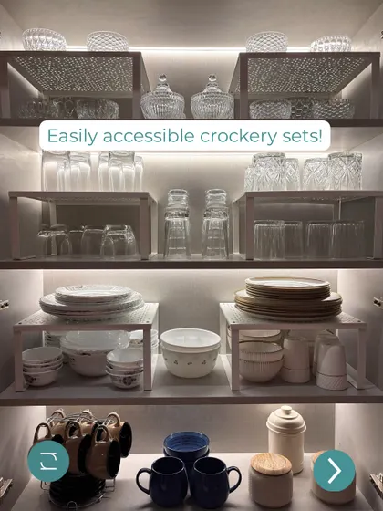 Easily accessible crockery sets. We use shelf risers to double the storage space and keep plates, bowls, and glasses separated and easy to grab.