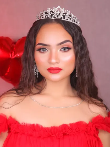 Our take on a Valentine's Day look. A classic red lip, soft smokey eyes, and a princess tiara for that extra touch of romance.