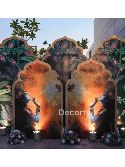 The main Krishna-themed backdrop, a perfect setting for photos and the central focus of the celebration.
