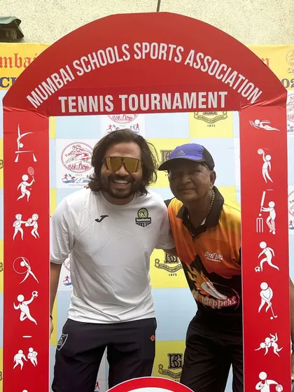 Our founder with an official at the MSSA tournament, highlighting the strong relationships we build within the sports community.