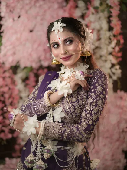 A portrait capturing the gentle and devotional expression of Radha.