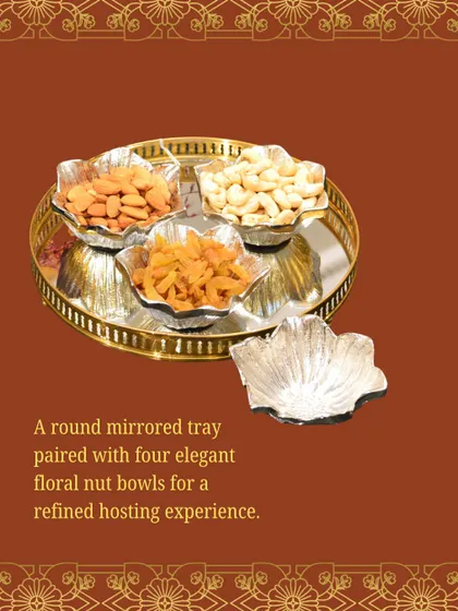 A round mirrored tray paired with four elegant floral nut bowls. This set offers a refined hosting experience, perfect for serving guests during wedding celebrations.