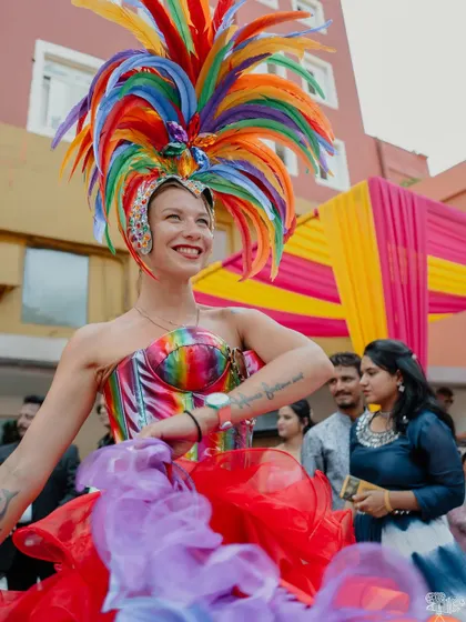 Master of Carnival Magic. This artist in a spectacular rainbow costume brought an extraordinary touch of wonder and whimsy to the event.