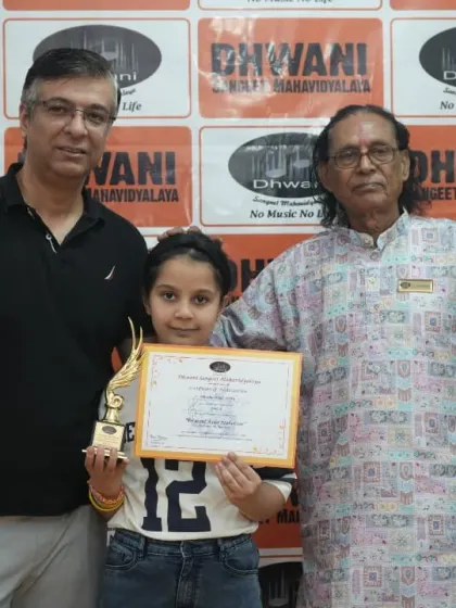 A student with her father and guru, a proud moment.