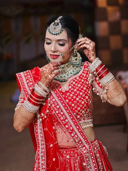 Another angle showing the intricate details of the makeup and jewelry.
