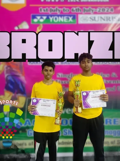Saiesh and Aaditya with their bronze medals and trophies after their podium finish in the U15 boys doubles at the Yonex-Sunrise State Ranking Tournament.