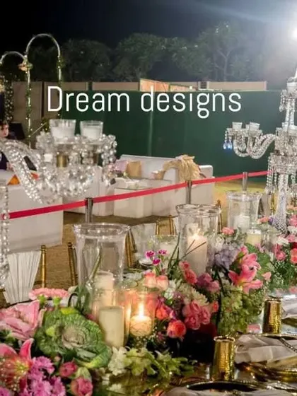 Luxury is in the details. This long dining table showcases my approach to opulent table settings, featuring lush floral runners and magnificent crystal candelabras that reflect the light and create an atmosphere of pure sophistication.