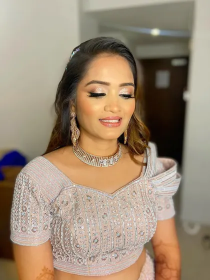A close-up of the glittery eye makeup. This look is all about making a statement and having fun.