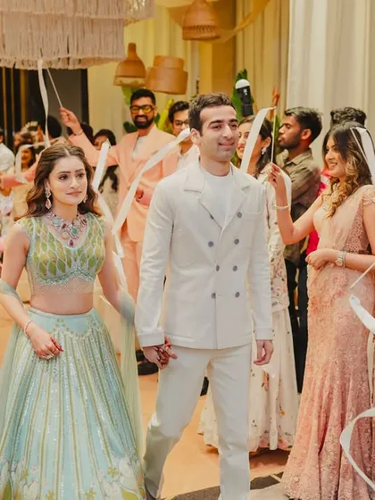 Even a simple entrance can become a celebration. We created this joyful ribbon pathway for the couple's carnival-themed event, turning their arrival into an interactive and lively moment for everyone.