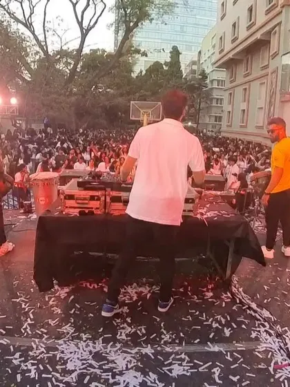 On stage with the Beat Gurus percussion team, with confetti covering the ground after a huge drop.