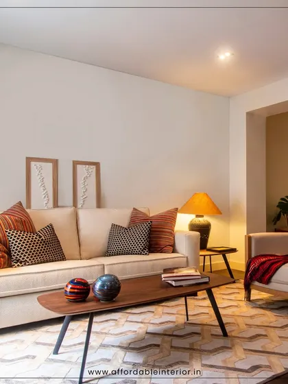 Another view of a warm and inviting living room, showcasing how we use textures and lighting to make a space feel like home.