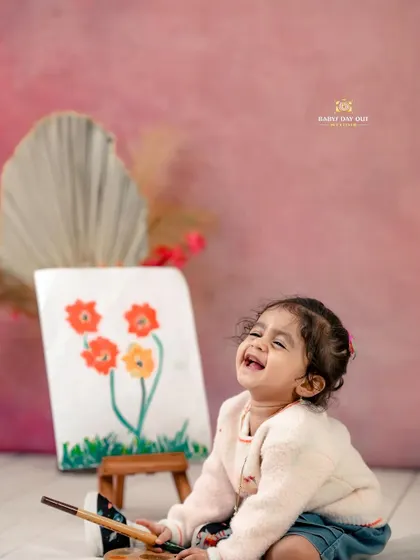 The purest laugh from a little artist. We love capturing these moments of genuine happiness during our photoshoots.