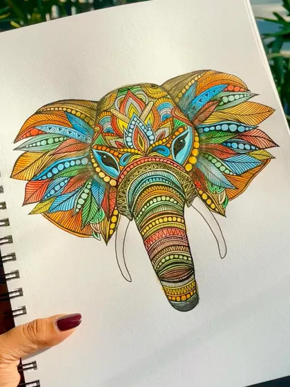 Beyond walls and client projects, sometimes it’s just about creating for myself. A colorful elephant mandala sketch from my personal drawing book.