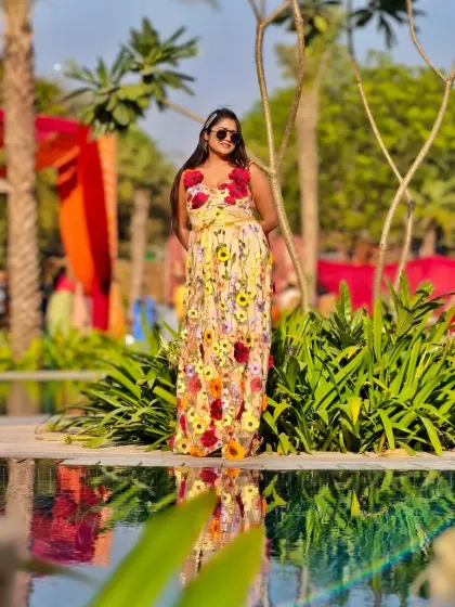 A poolside shot reflecting the vibrant colors of the Haldi decor. The entire resort was transformed into a carnival for Ayush and Pragati's celebration.